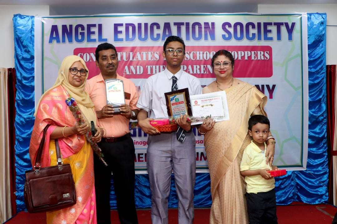 Class 10 Topper Erfan Ali felicitated with his parents.